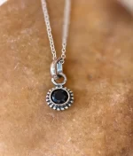 925 sterling silver black onyx pendant with round cut gemstone and handcrafted rawa work border
