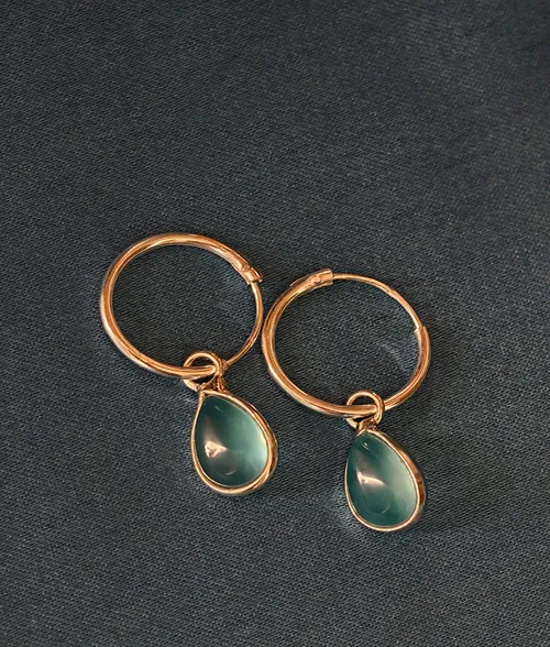Blue Chalcedony Teardrop Hoop Earrings Shop Blue Chalcedony Teardrop Hoop Earrings in 925 sterling silver.